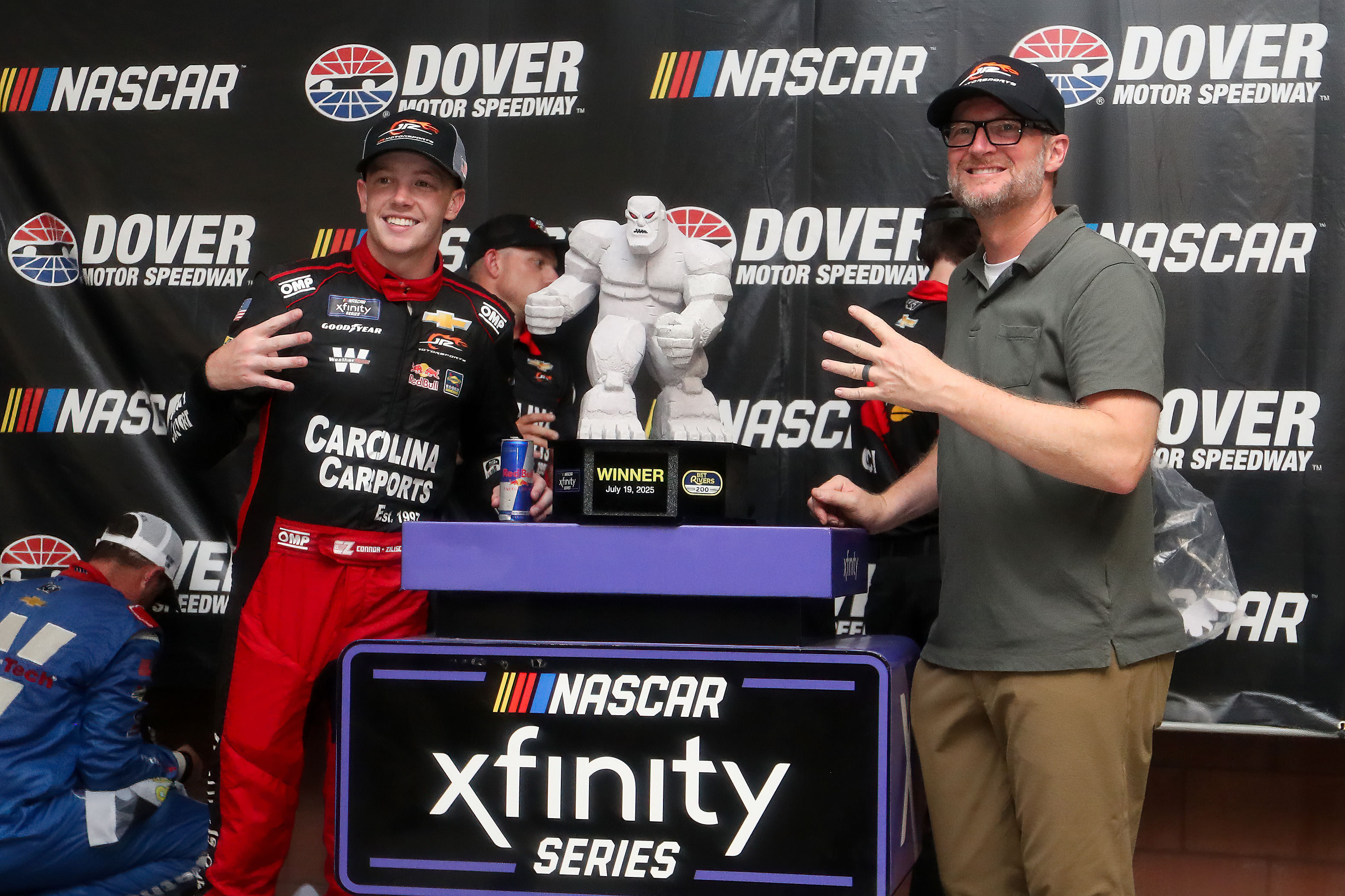 Connor Zilisch (left) celebrates in victory lane with owner Dale Earnhardt Jr. (right) after winning the BetRivers 200 at Dover Motor Speedway - Source: Imagn